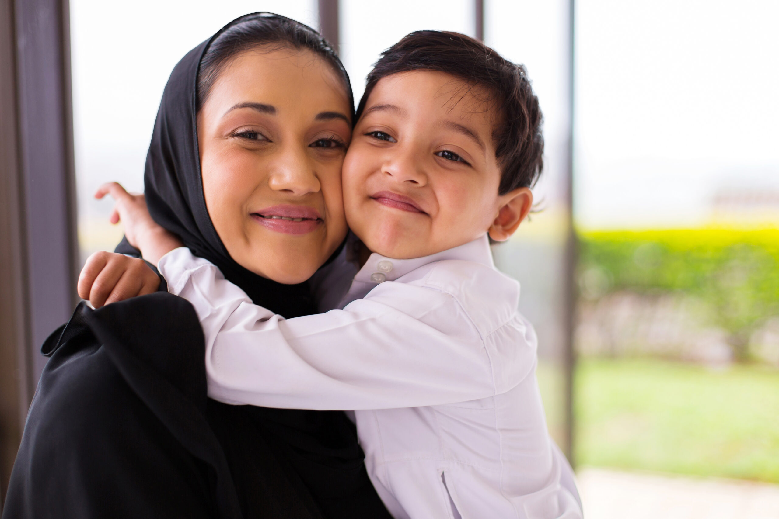 child hugging mom